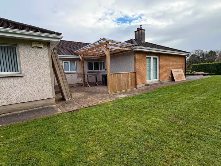The back of the bungalow before the extension, with the old pergola